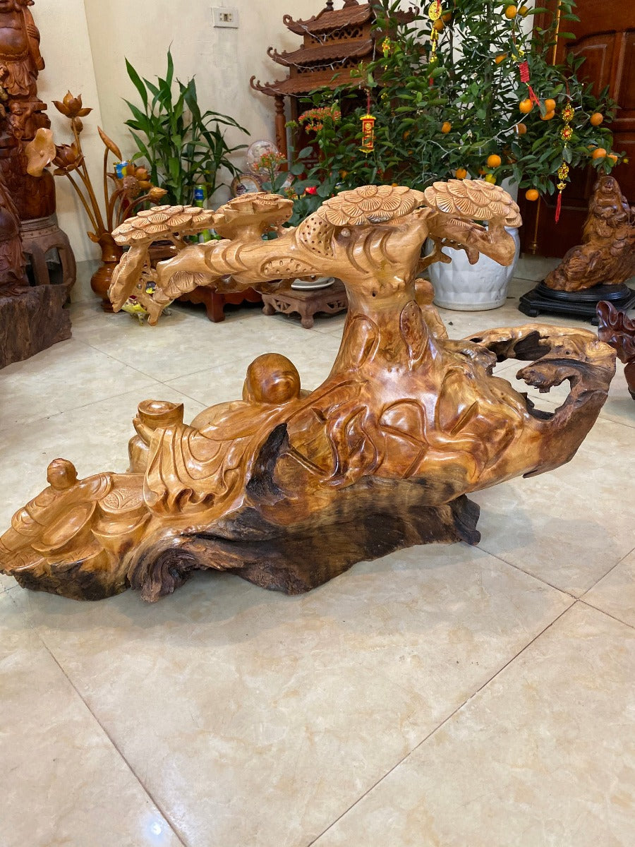 Tượng Di Lặc Ngồi Tán Tùng Pơ Mu