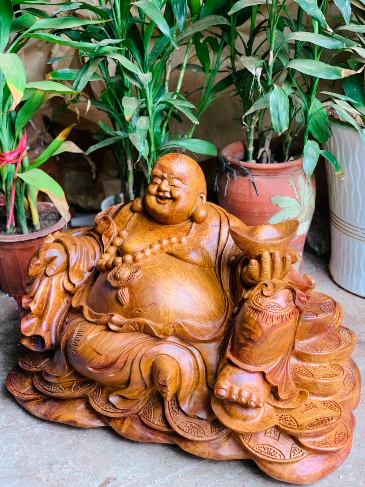 Tượng di lặc ngồi bao tiền gỗ hương ta