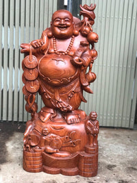 Di Lặc Nhị Phúc Đứng Gánh Cành Đào