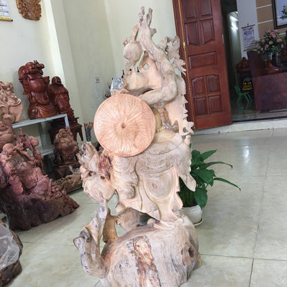 Tượng Di Lặc Vác Cành Đào Gỗ Pơ Mu