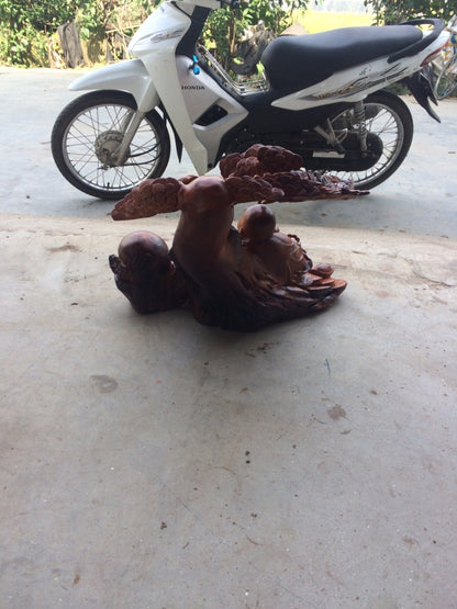 Phật Di Lặc Ngồi Gốc Tùng