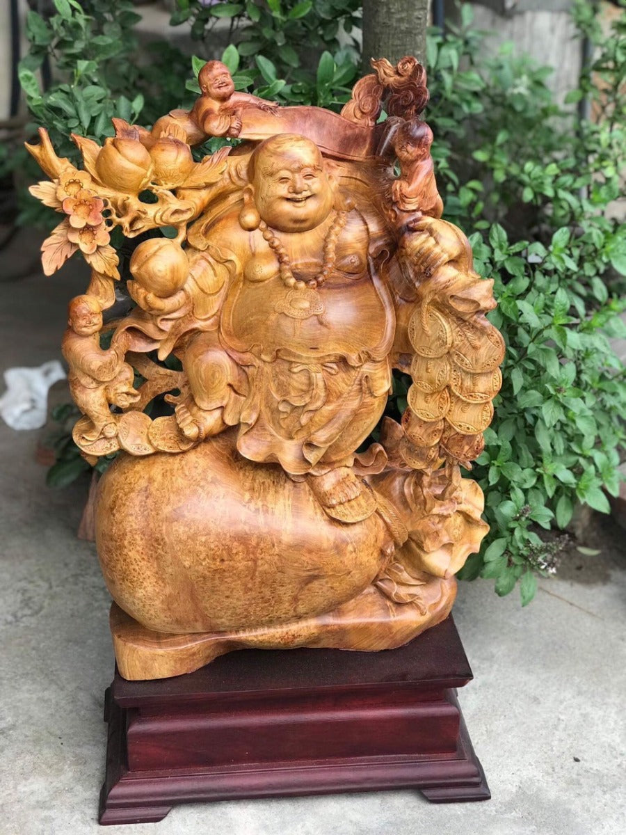 Tượng Di Lặc Vác Cành Đào Nu Hương