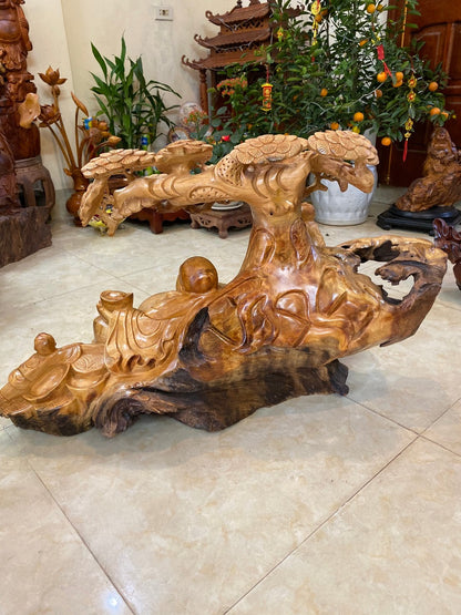 Tượng Di Lặc Ngồi Tán Tùng Pơ Mu