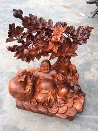 Di Lặc Ngồi Gốc Mai