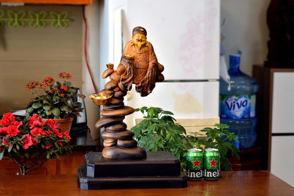 Tượng Thần Tài Ngồi Tầng Đá