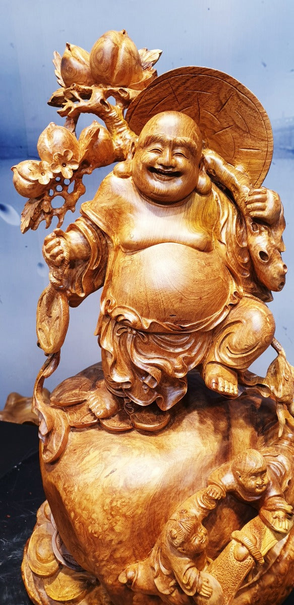 Tượng Di Lặc Vác Cành Đào Nu Hương