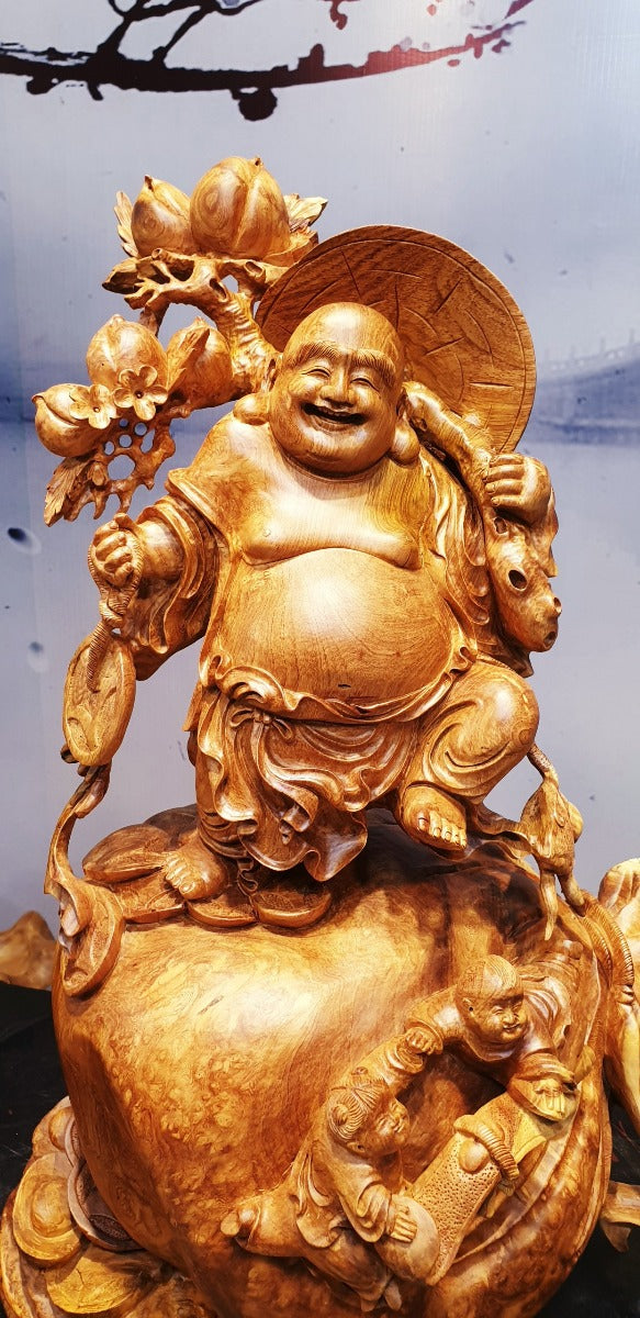 Tượng Di Lặc Vác Cành Đào Nu Hương