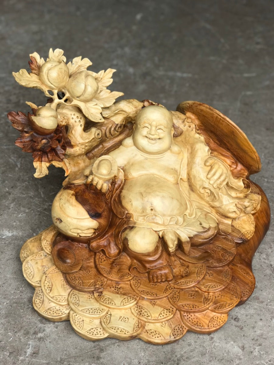 Tượng Di Lặc Vác Cành Đào Tựa Bao Tiền