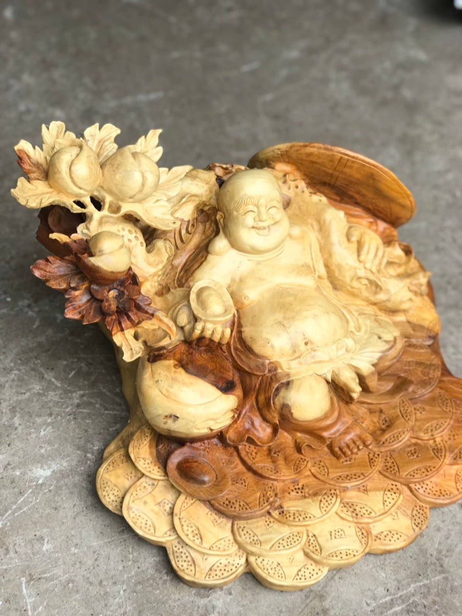 Tượng Di Lặc Vác Cành Đào Tựa Bao Tiền