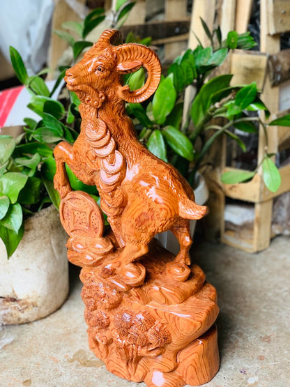 Dê Núi Ngậm Chuồi Tiền Tài Lộc