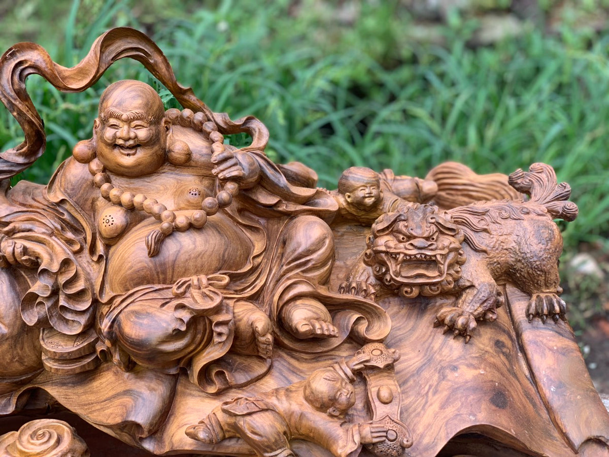 Tượng Di Lặc Tam Phúc Ngồi Cầm Cuốn Thư - Gỗ Bách Xanh